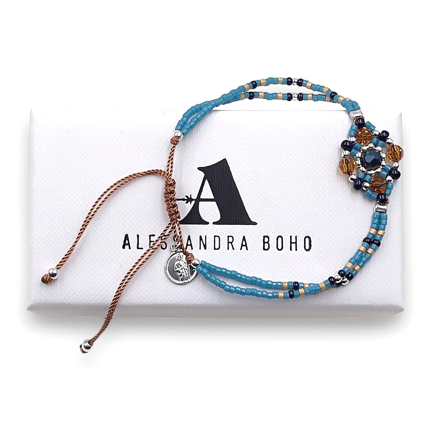Pulsera con Swarovski, Miyuki y Mini Medalla de San Judas Tadeo en Cordón Marrón